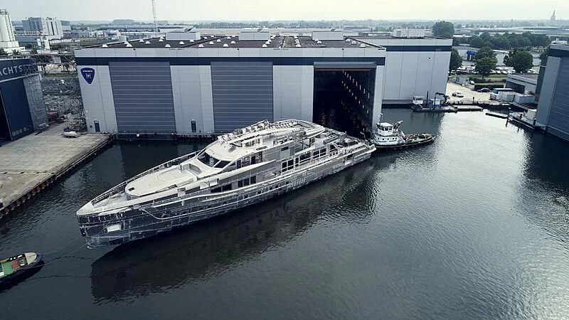 a large white boat in a body of water aboard ULTRA G Yacht for Sale