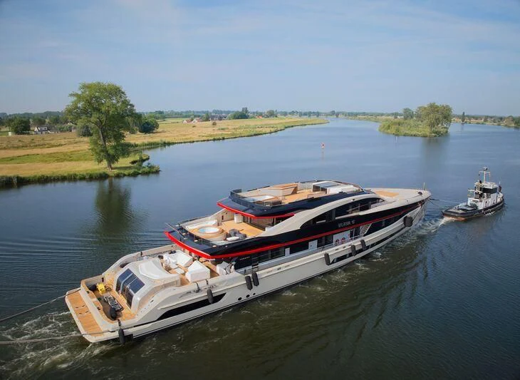 a group of boats on a river aboard ULTRA G Yacht for Sale