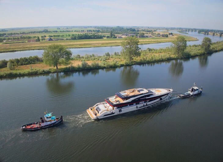 a group of boats on a river aboard ULTRA G Yacht for Sale