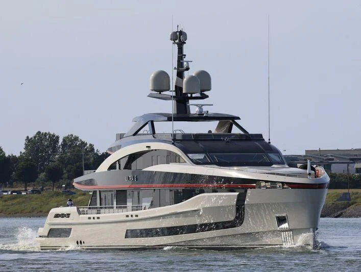 a large boat on the water aboard ULTRA G Yacht for Sale