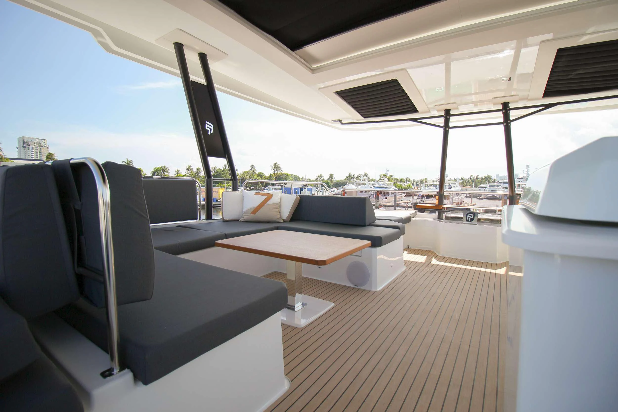 a room with a couch and a table aboard PRINCESS MILA Yacht for Charter