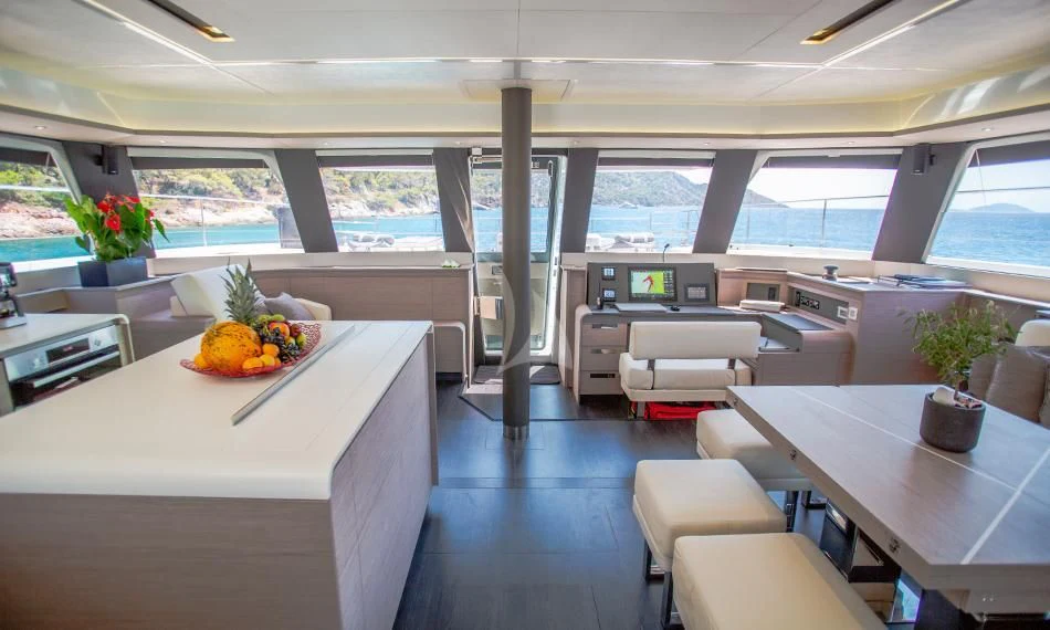 a room with a table and chairs aboard PRINCESS MILA Yacht for Charter