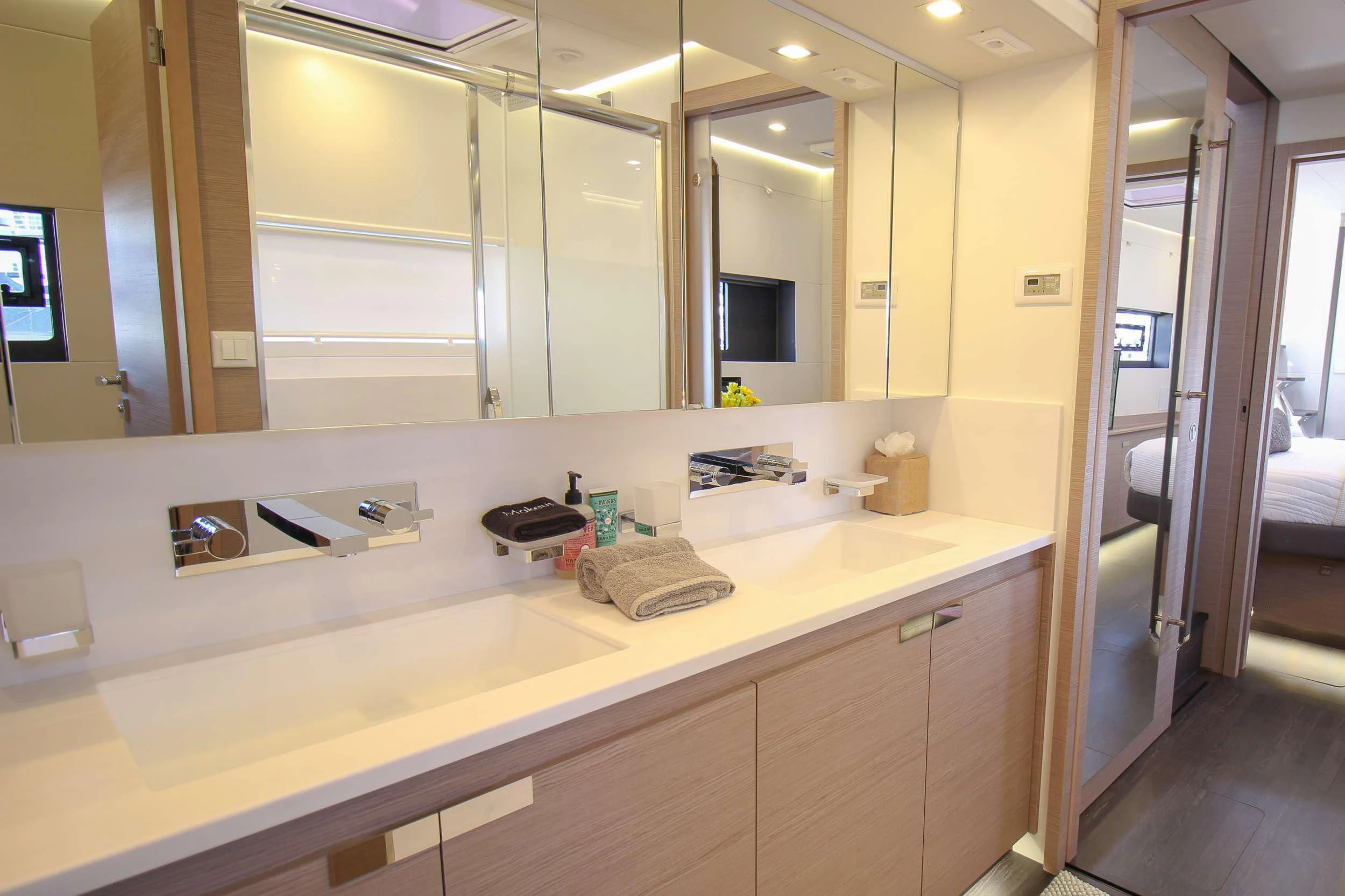 a bathroom with a large mirror aboard PRINCESS MILA Yacht for Charter
