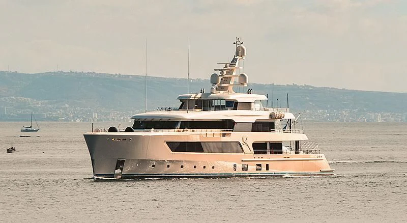 a large ship in the water aboard SAMAYA Yacht for Sale