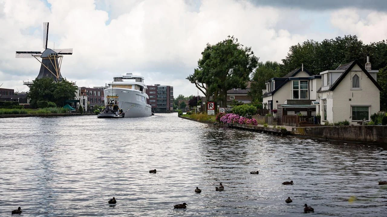 a body of water with boats and buildings along it aboard SAMAYA Yacht for Sale