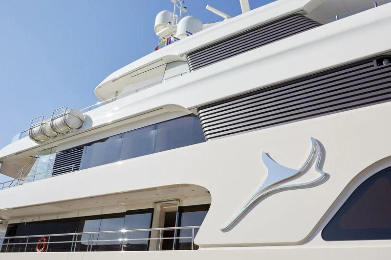 a white boat with a satellite dish on top aboard SAMAYA Yacht for Sale