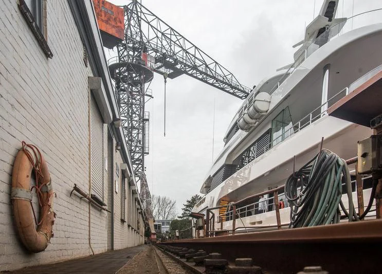 a person walking on a bridge aboard SAMAYA Yacht for Sale