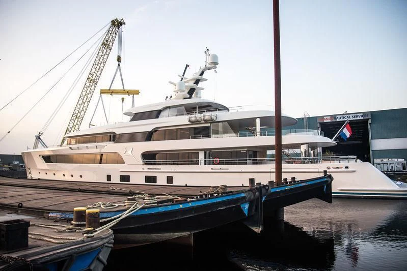 a large white boat docked aboard SAMAYA Yacht for Sale