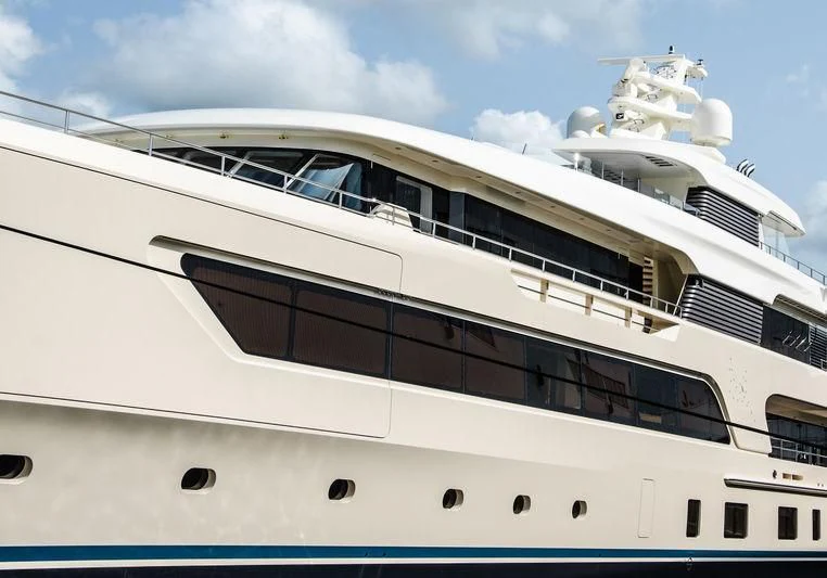 a large white yacht aboard SAMAYA Yacht for Sale