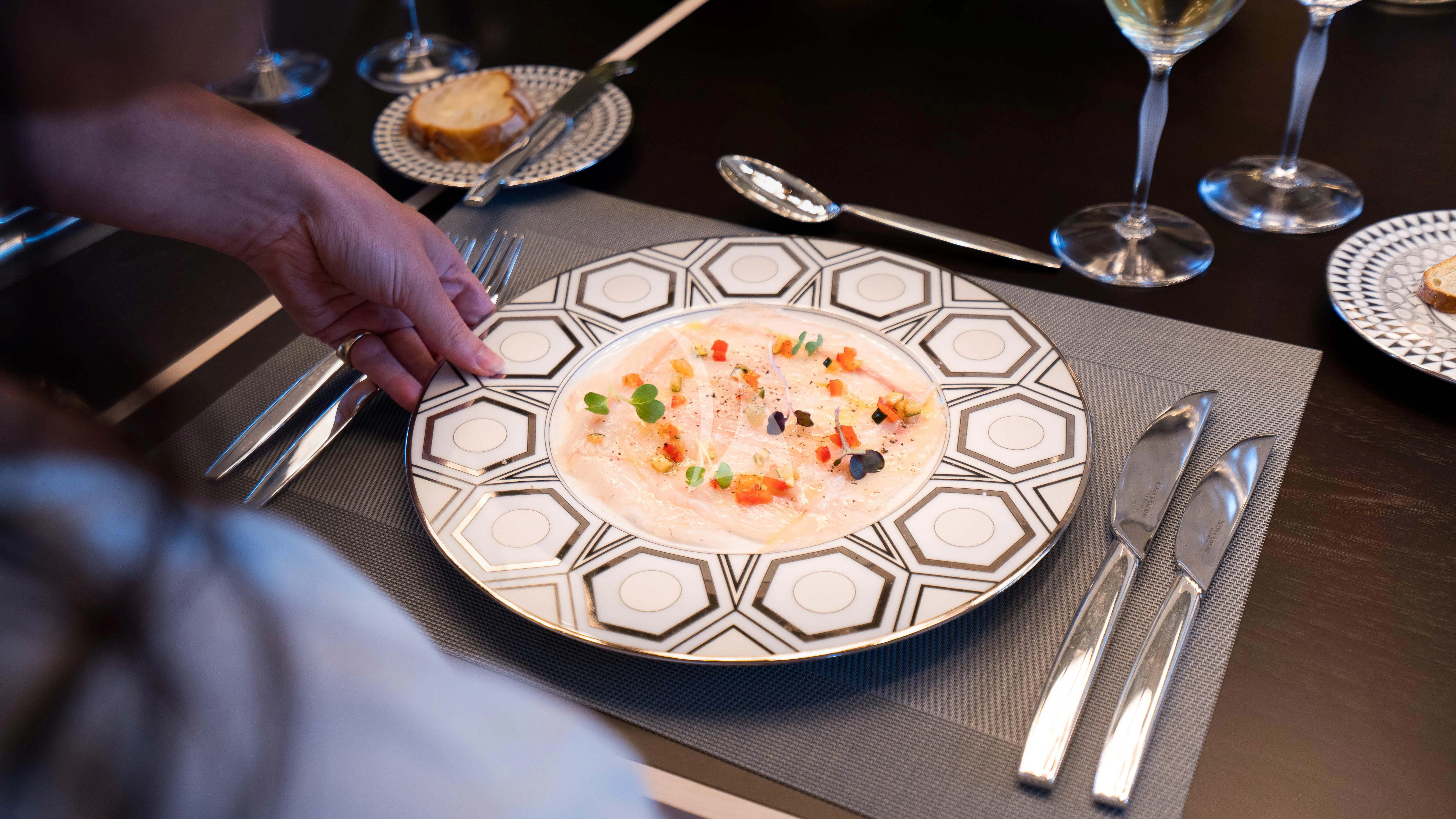 a plate of food aboard RELIANCE Yacht for Sale