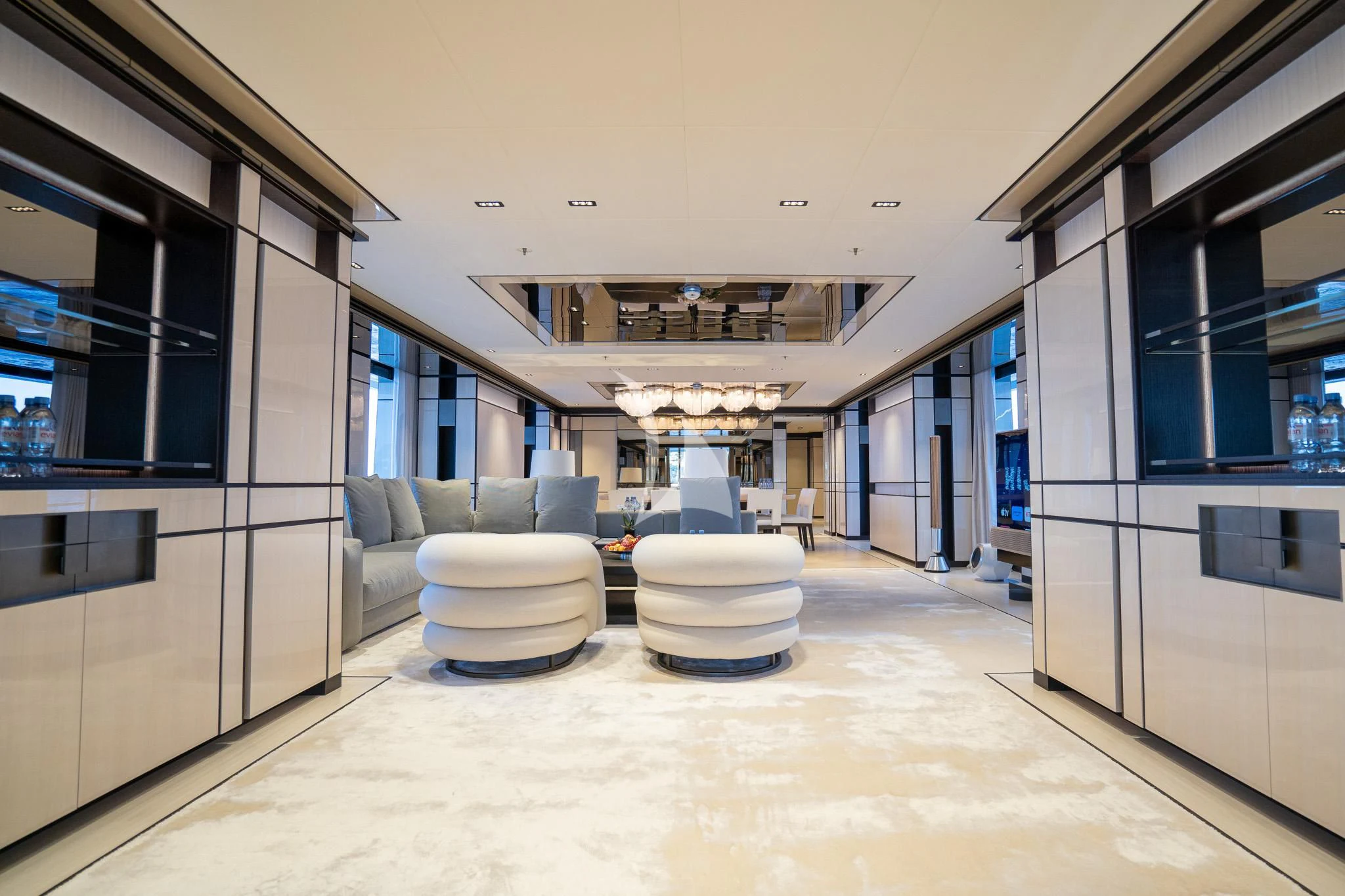 a large room with a large white and grey floor aboard RELIANCE Yacht for Sale