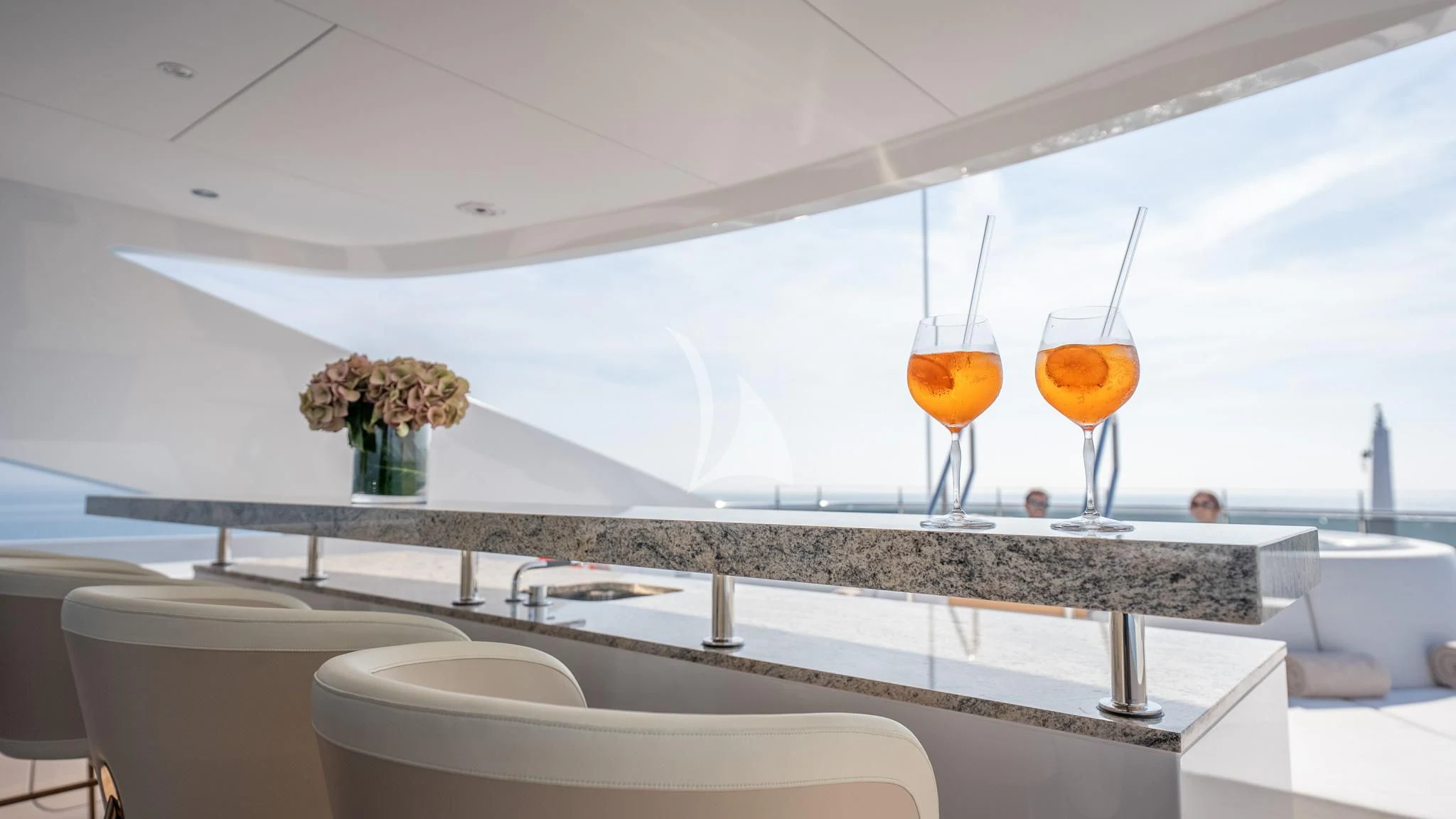 a large white room with a large window and a large sink with a large marble countertop with aboard RELIANCE Yacht for Sale