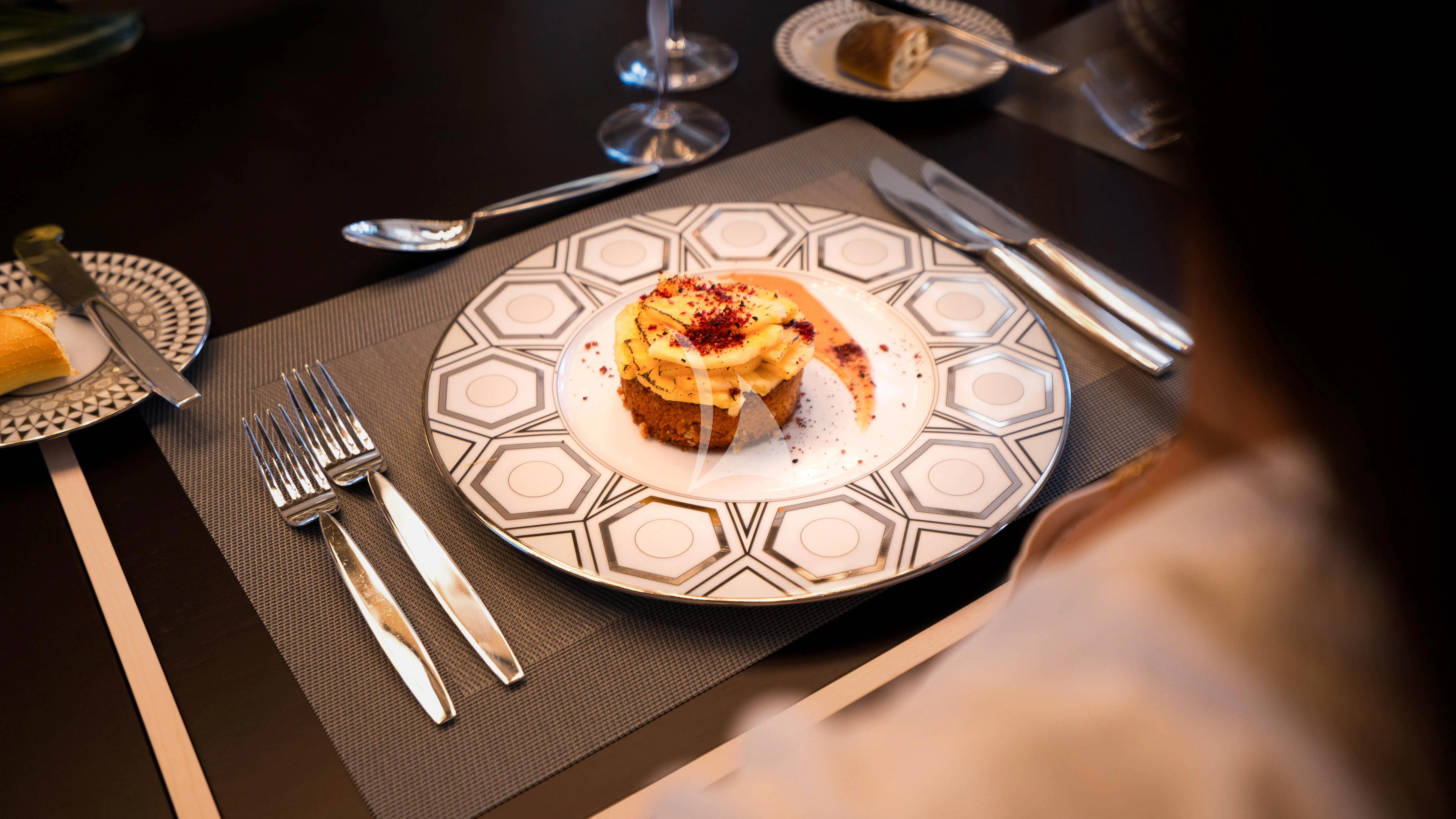 a plate of food aboard RELIANCE Yacht for Sale