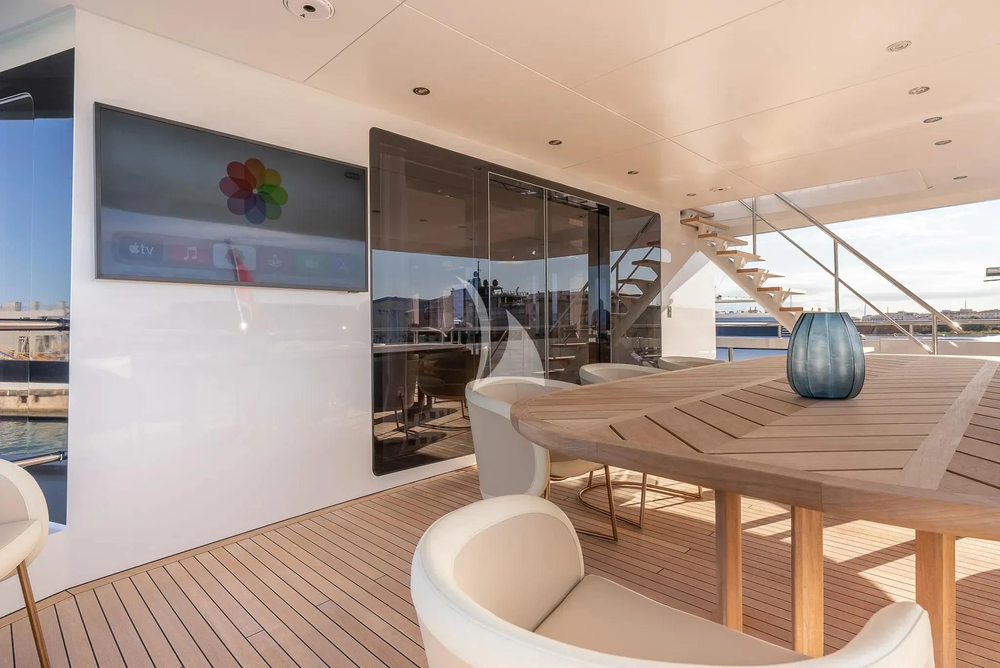 a room with a table and chairs aboard RELIANCE Yacht for Sale