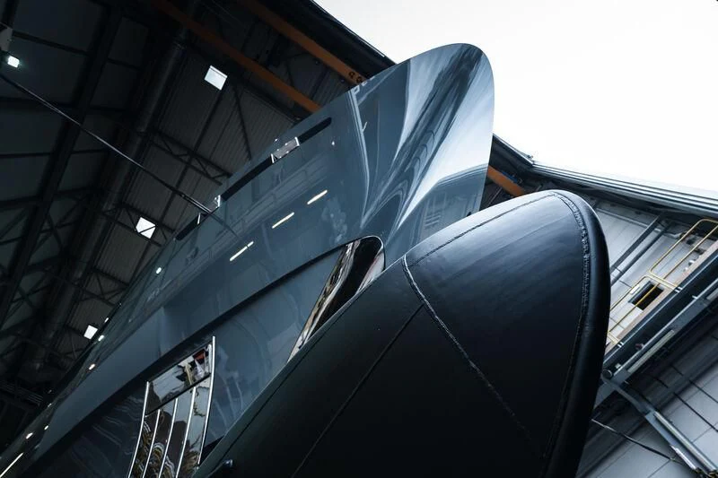 a large metal staircase aboard RELIANCE Yacht for Sale