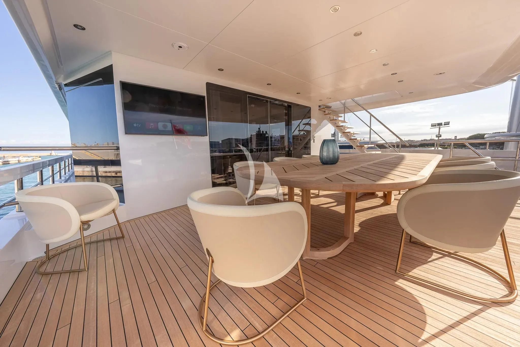 a room with a table and chairs aboard RELIANCE Yacht for Sale