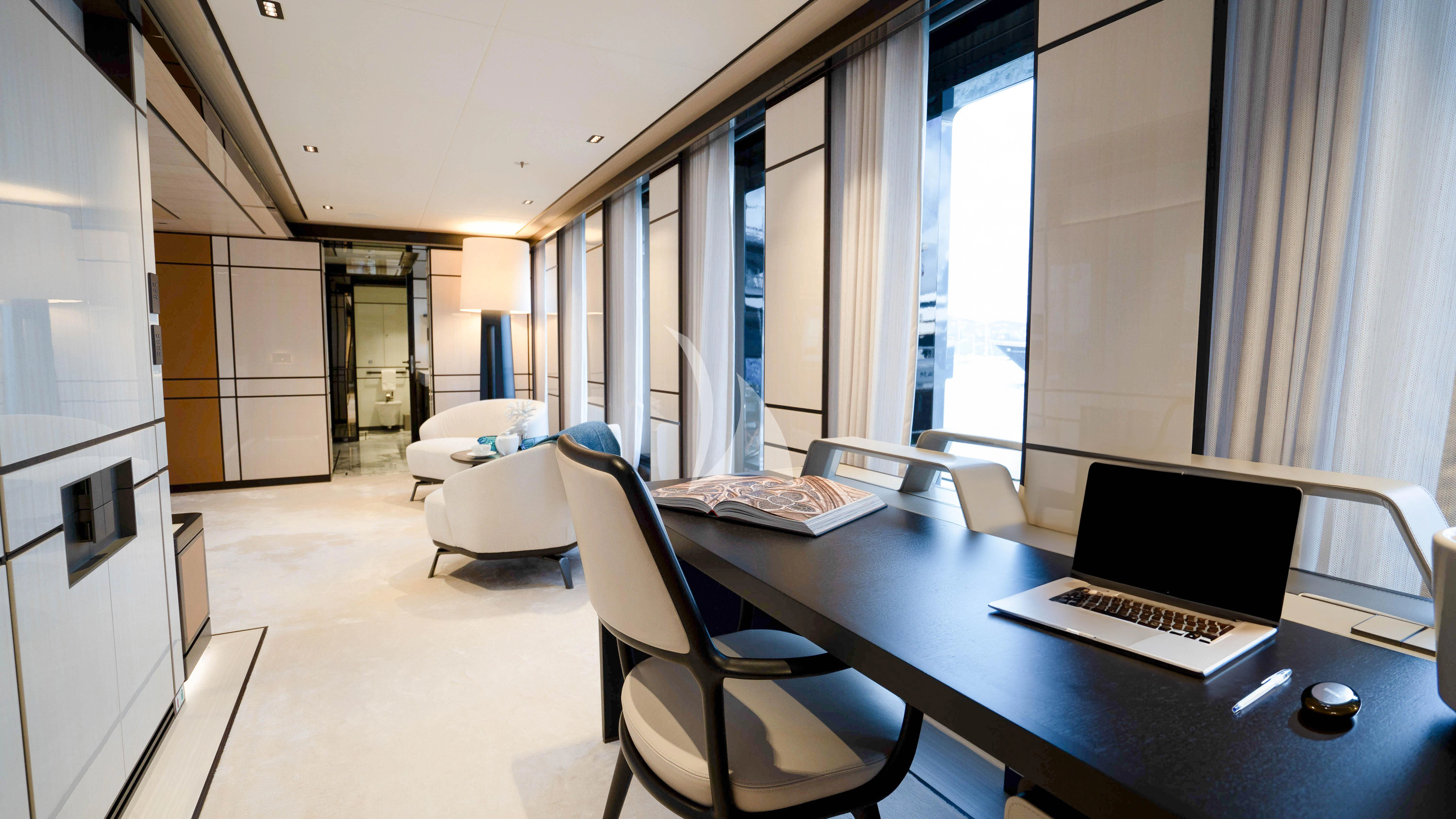 a room with a desk and a laptop aboard RELIANCE Yacht for Sale