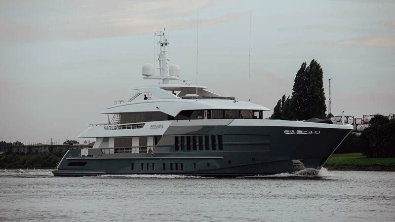 a large boat on the water aboard RELIANCE Yacht for Sale