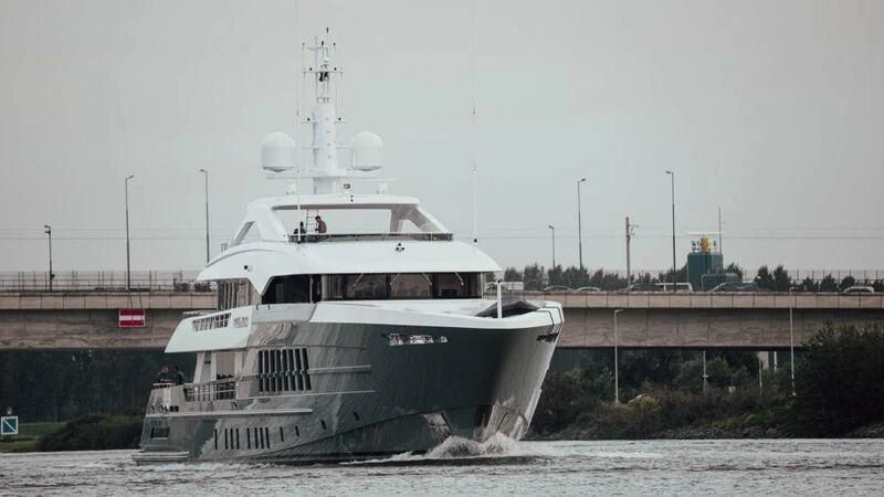 a large boat on the water aboard RELIANCE Yacht for Sale