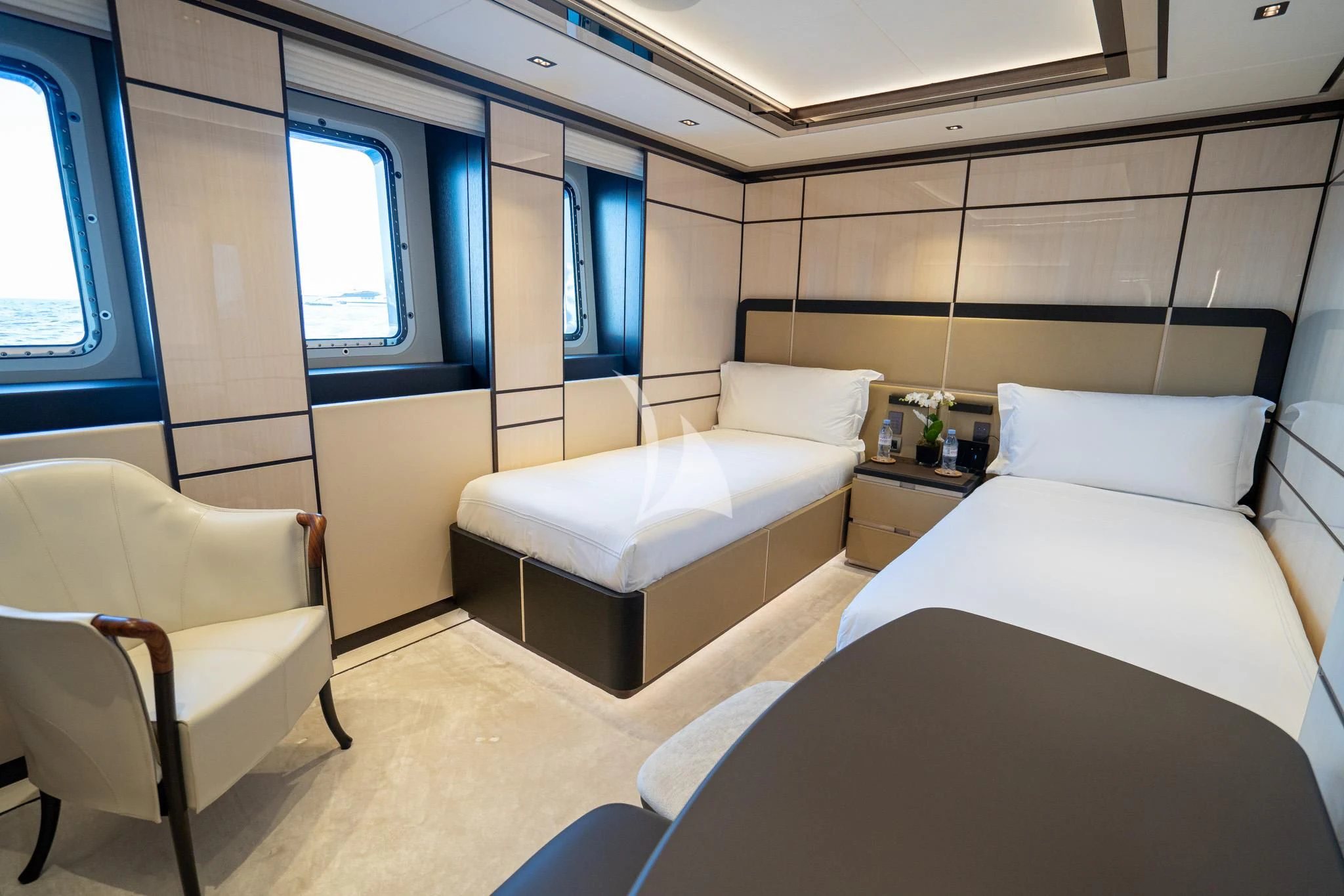 a room with two beds aboard RELIANCE Yacht for Sale