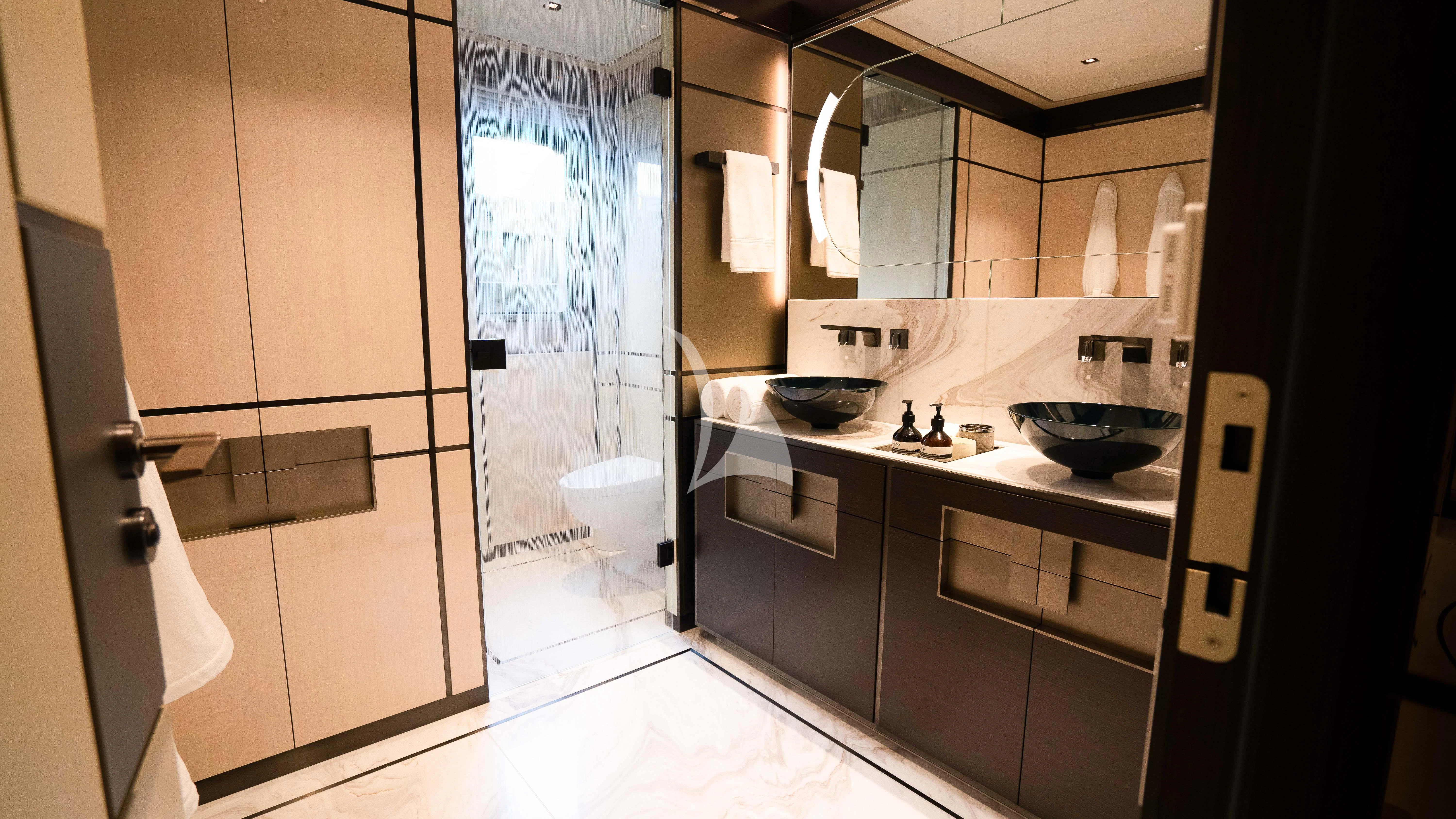 a bathroom with a sink and a mirror aboard RELIANCE Yacht for Sale