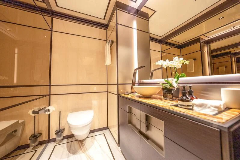 a bathroom with a sink and a toilet aboard RELIANCE Yacht for Sale