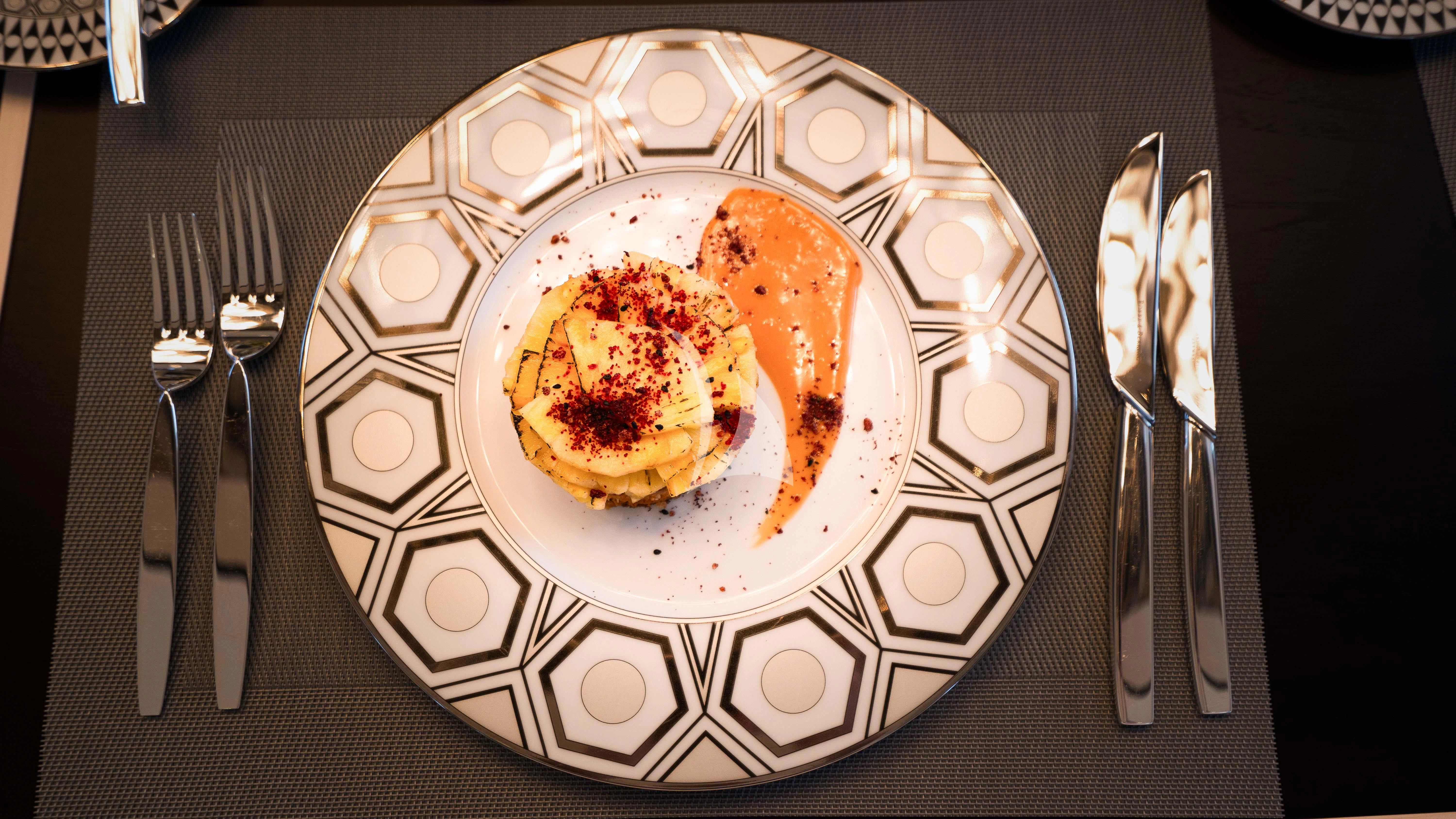 a plate of food aboard RELIANCE Yacht for Sale