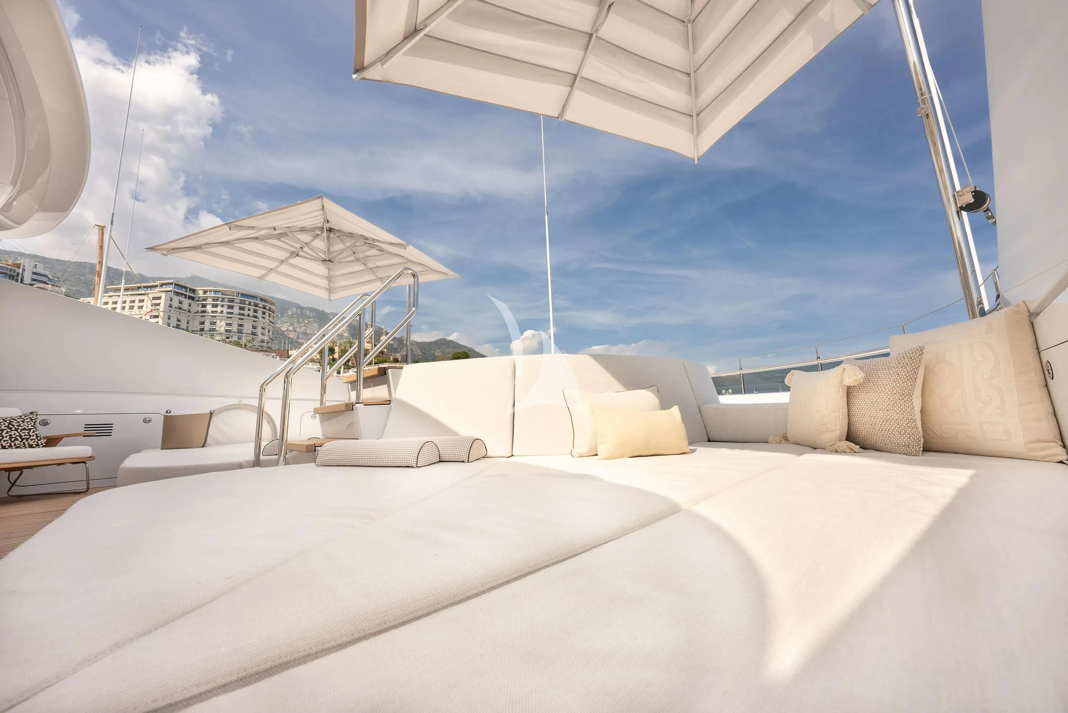 a bed with a white bed spread aboard RELIANCE Yacht for Sale