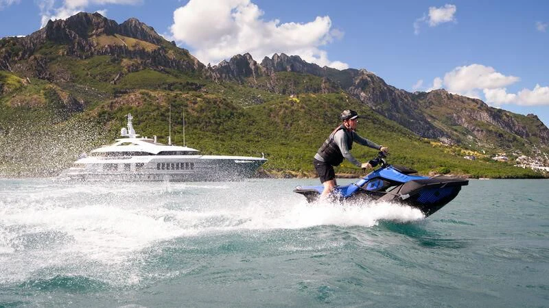 a man on a jet ski aboard RELIANCE Yacht for Sale