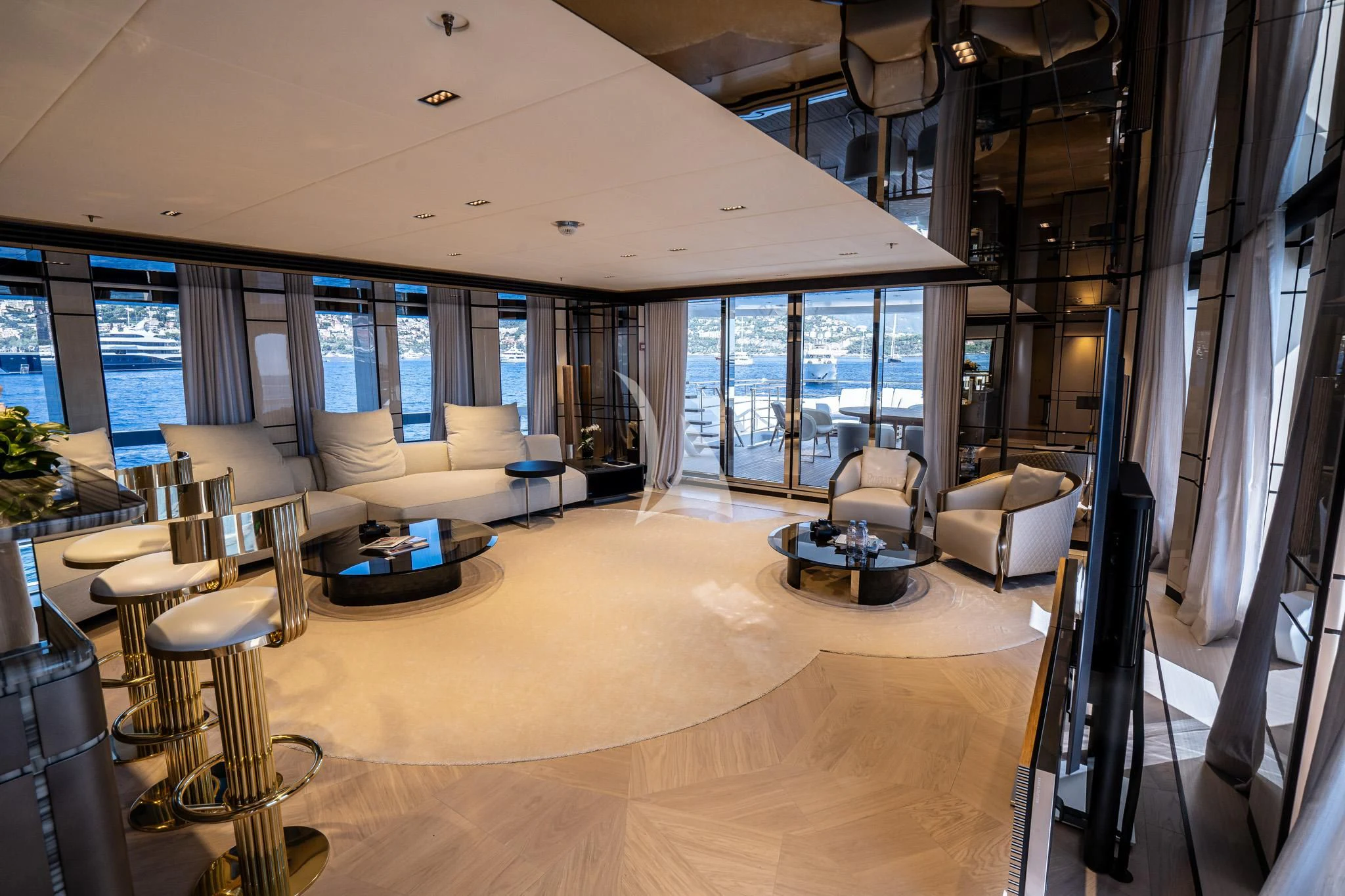 a living room with a large window aboard RELIANCE Yacht for Sale