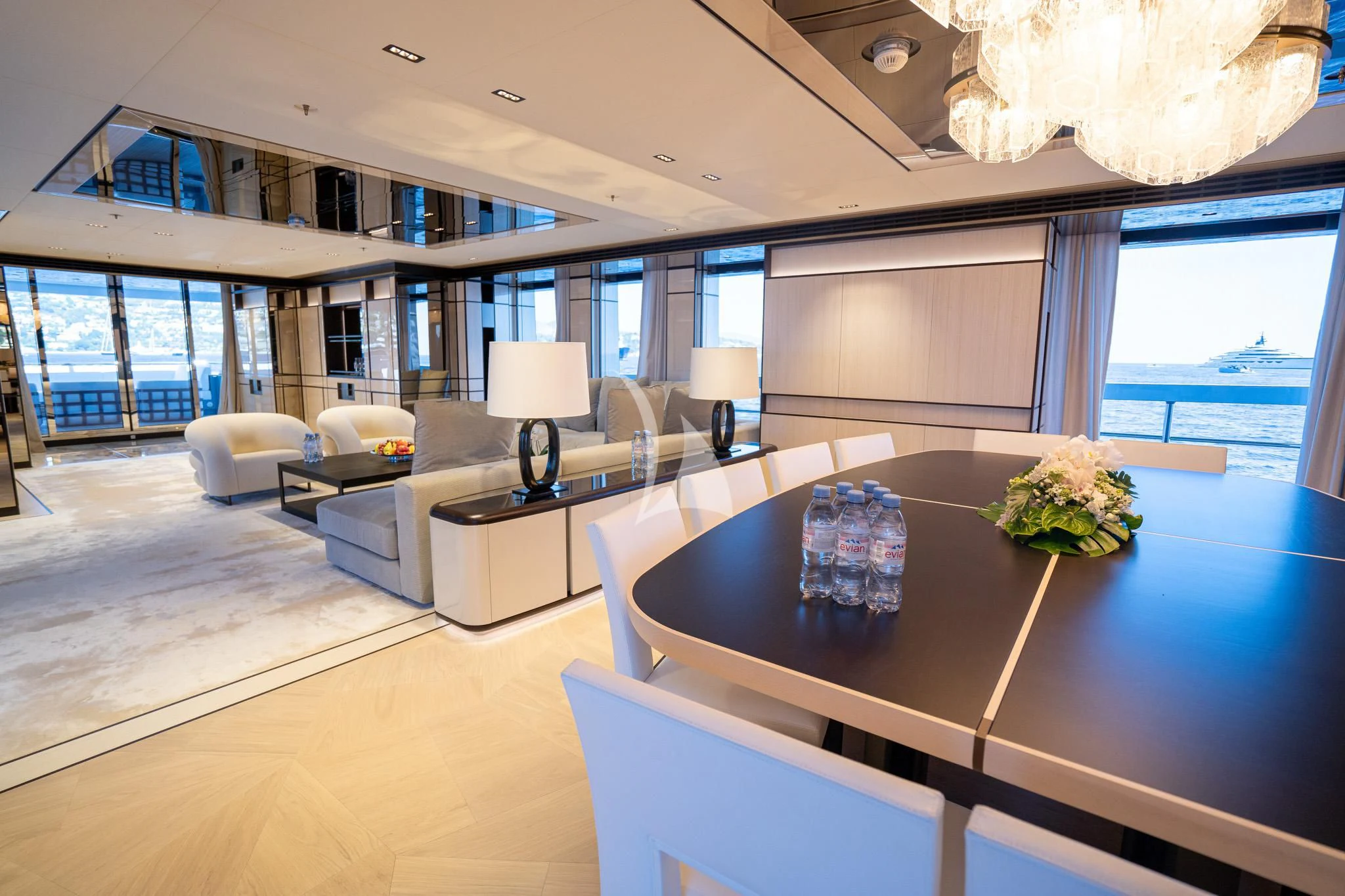 a large living room with a large window aboard RELIANCE Yacht for Sale