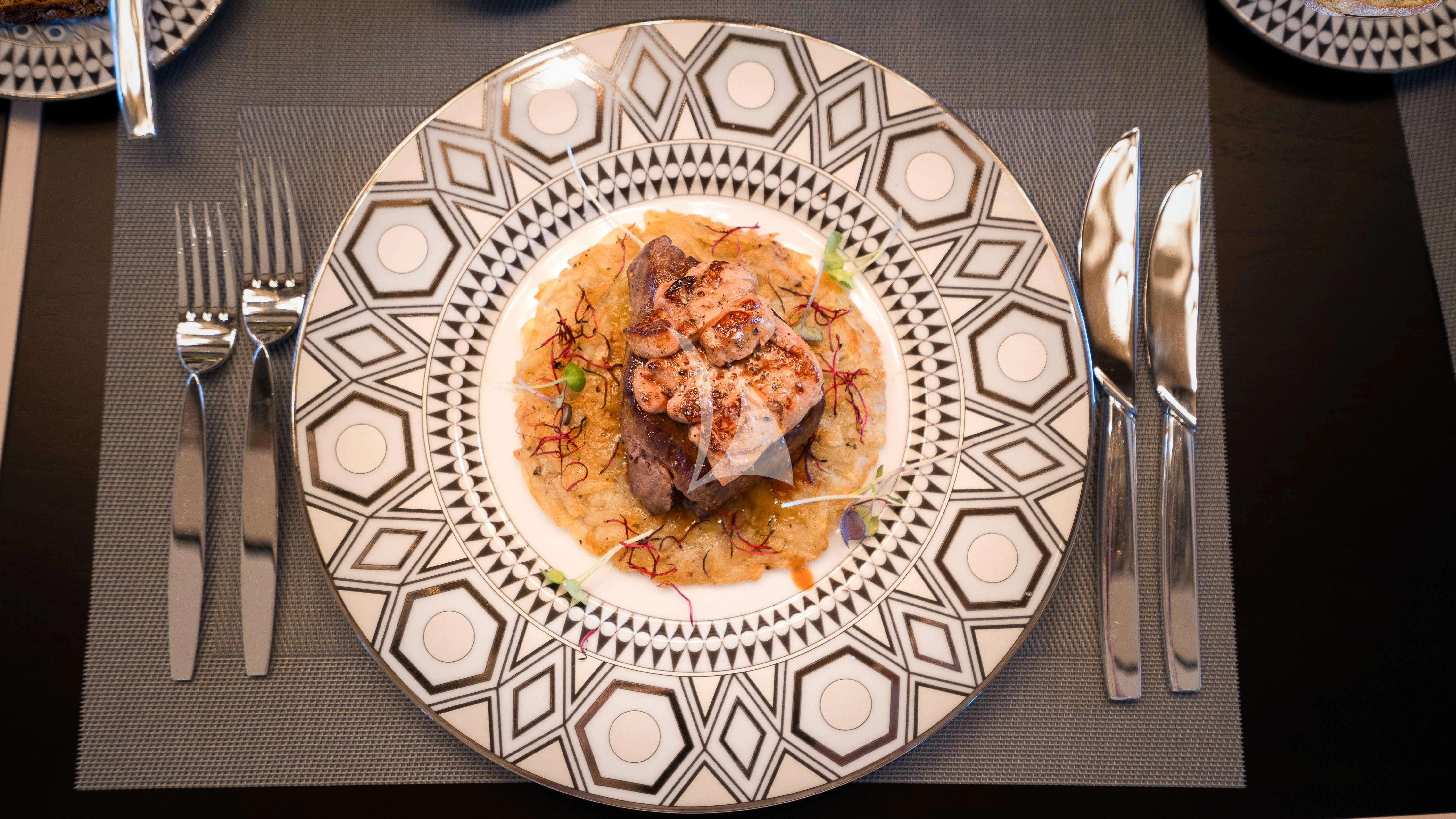 a plate of food aboard RELIANCE Yacht for Sale
