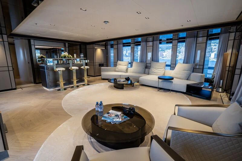 a living room with a large window aboard RELIANCE Yacht for Sale