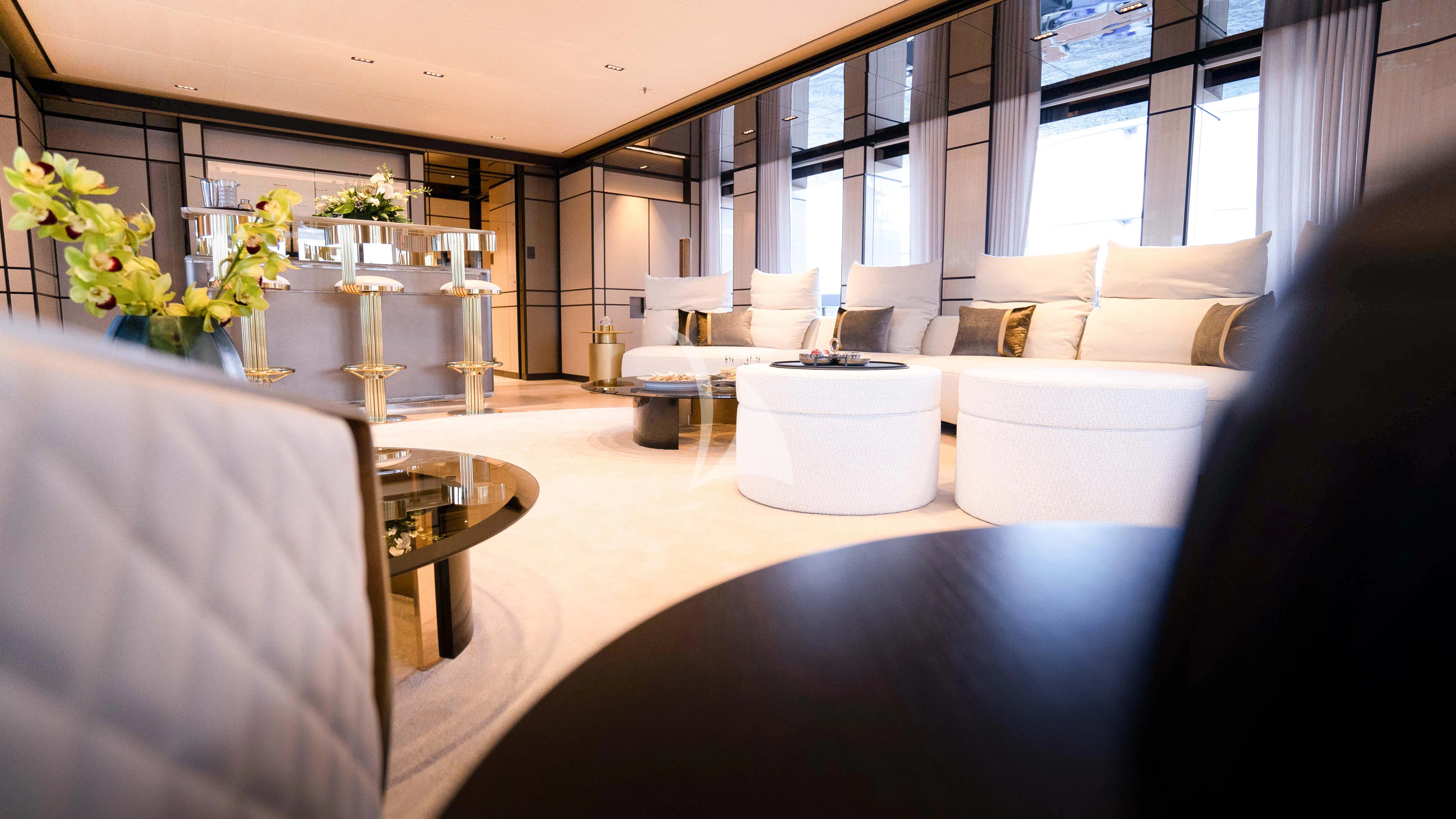 a room with a table and chairs aboard RELIANCE Yacht for Sale