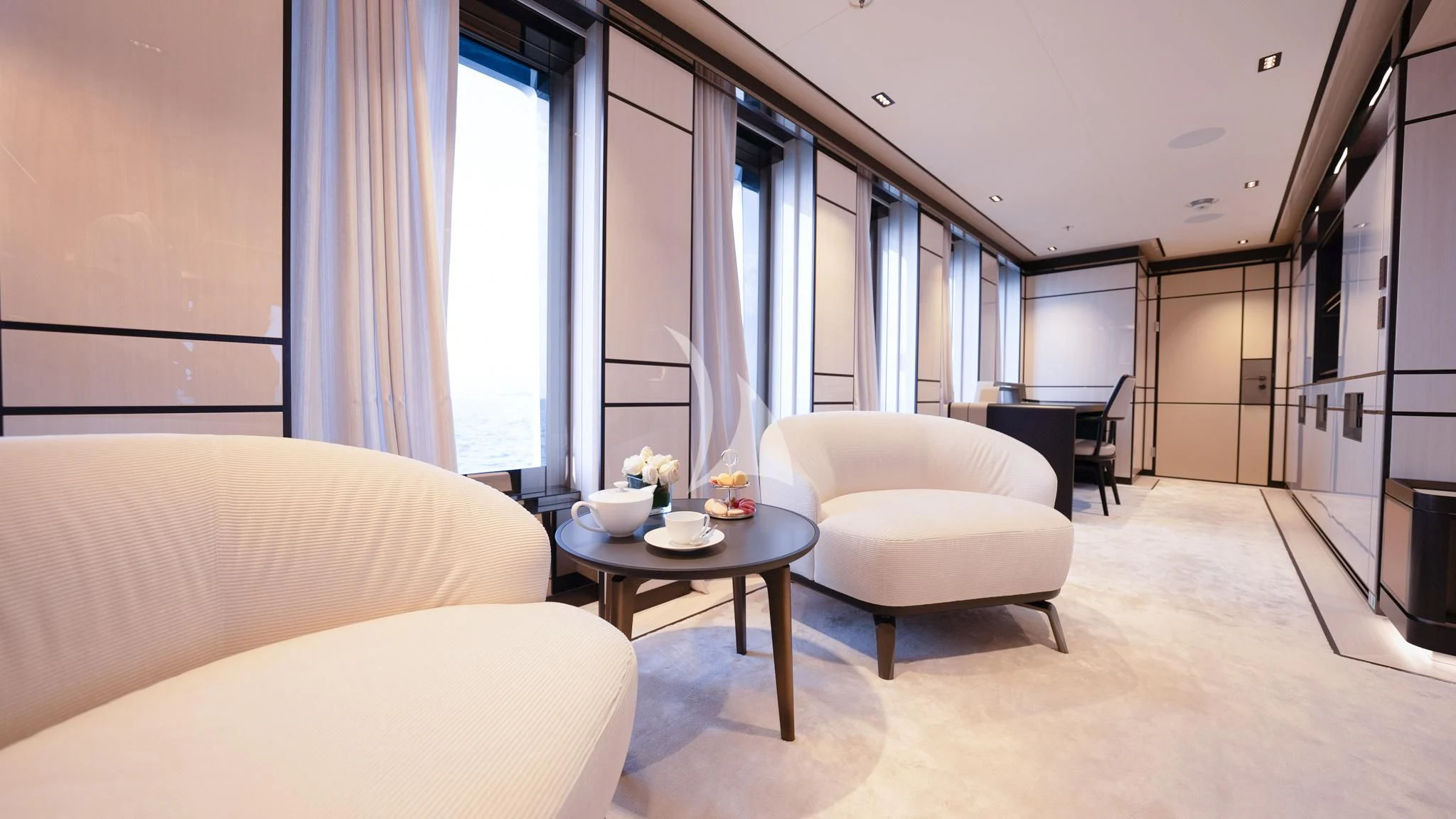 a living room with a couch and a coffee table aboard RELIANCE Yacht for Sale