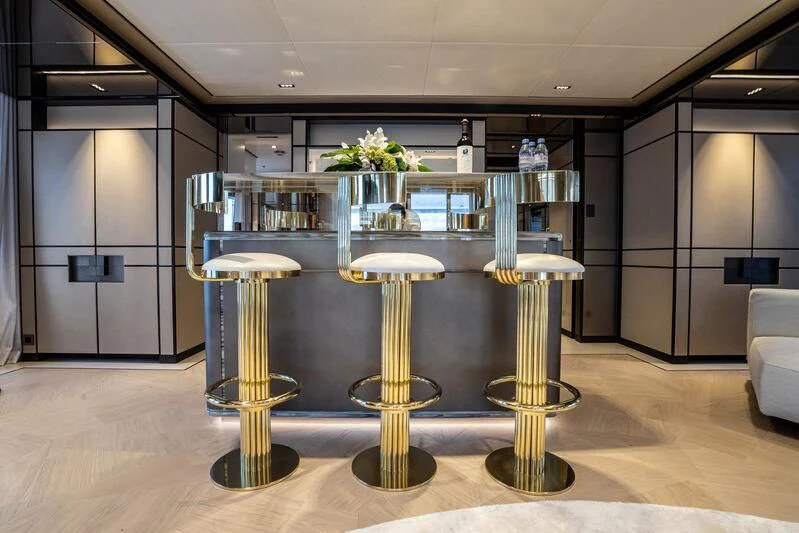 a large kitchen with a few stools aboard RELIANCE Yacht for Sale