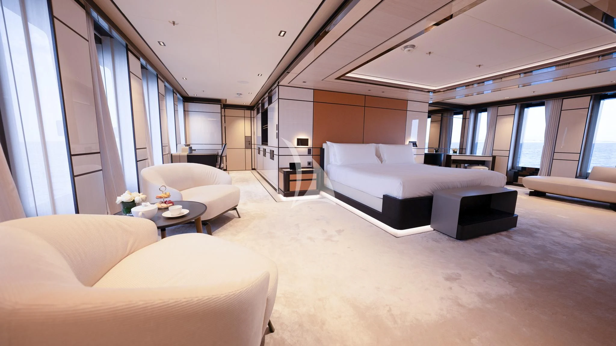 a room with a bed and a couch aboard RELIANCE Yacht for Sale