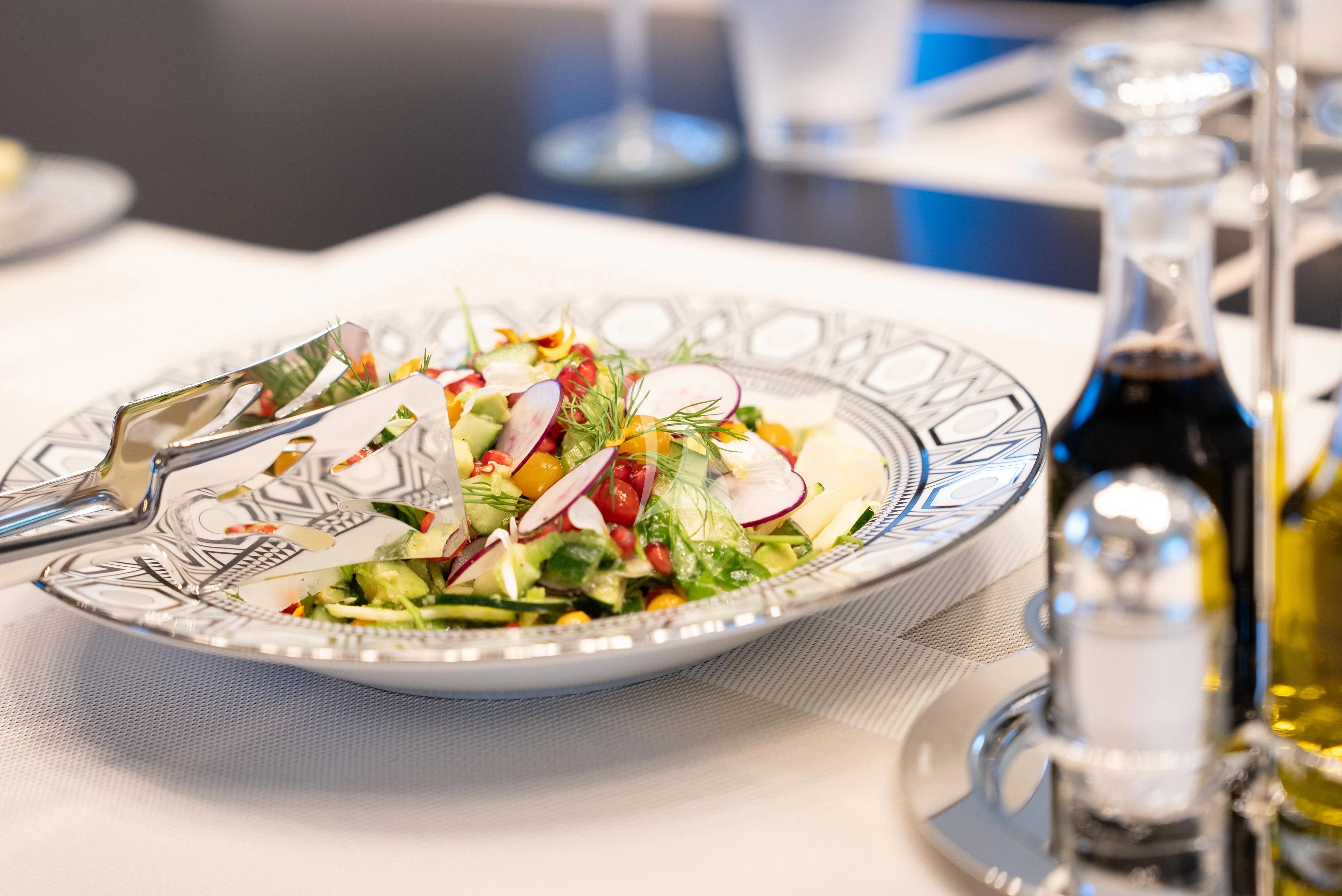a plate of salad aboard RELIANCE Yacht for Sale
