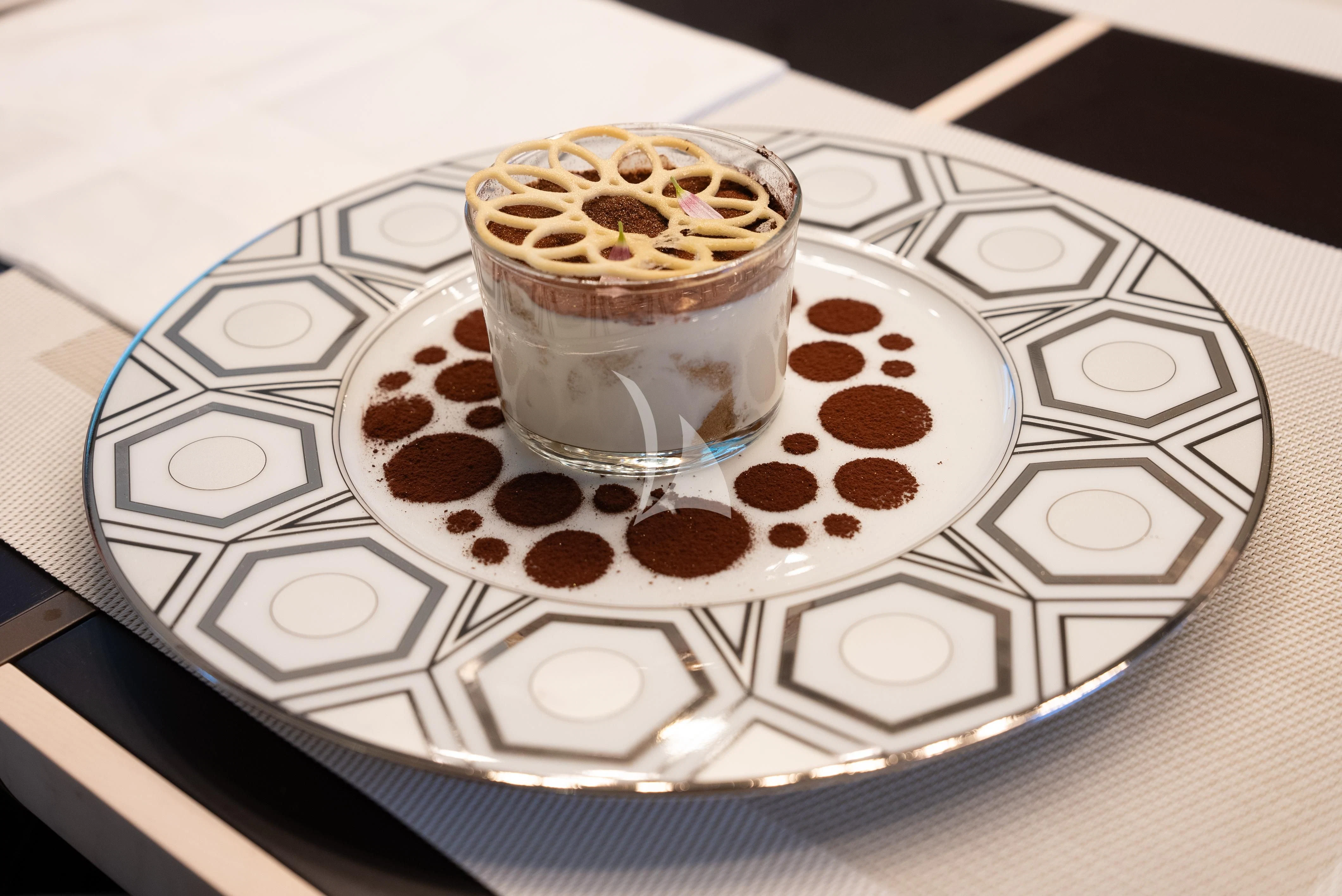 a glass of ice cream on a plate aboard RELIANCE Yacht for Sale