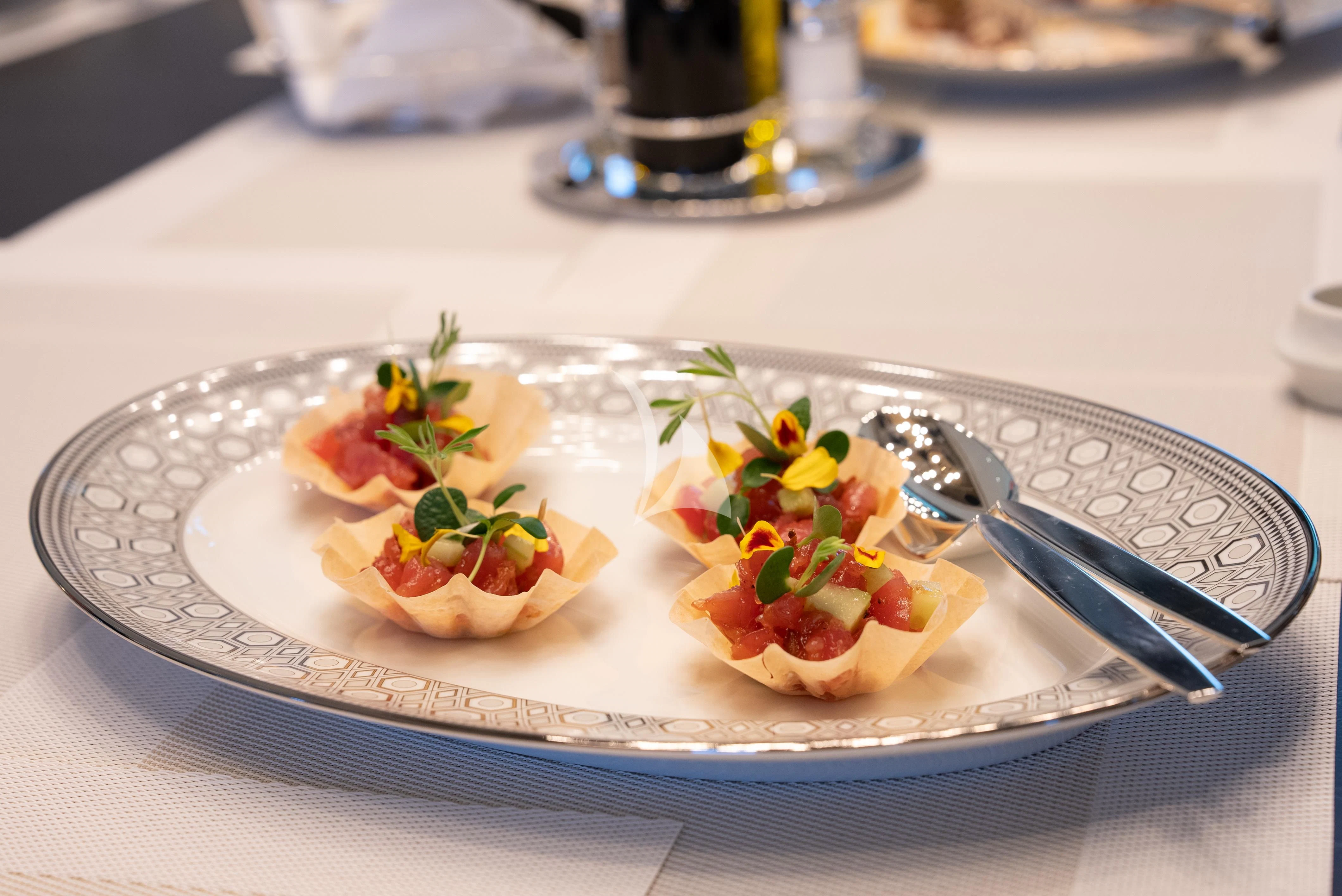 a plate of food aboard RELIANCE Yacht for Sale