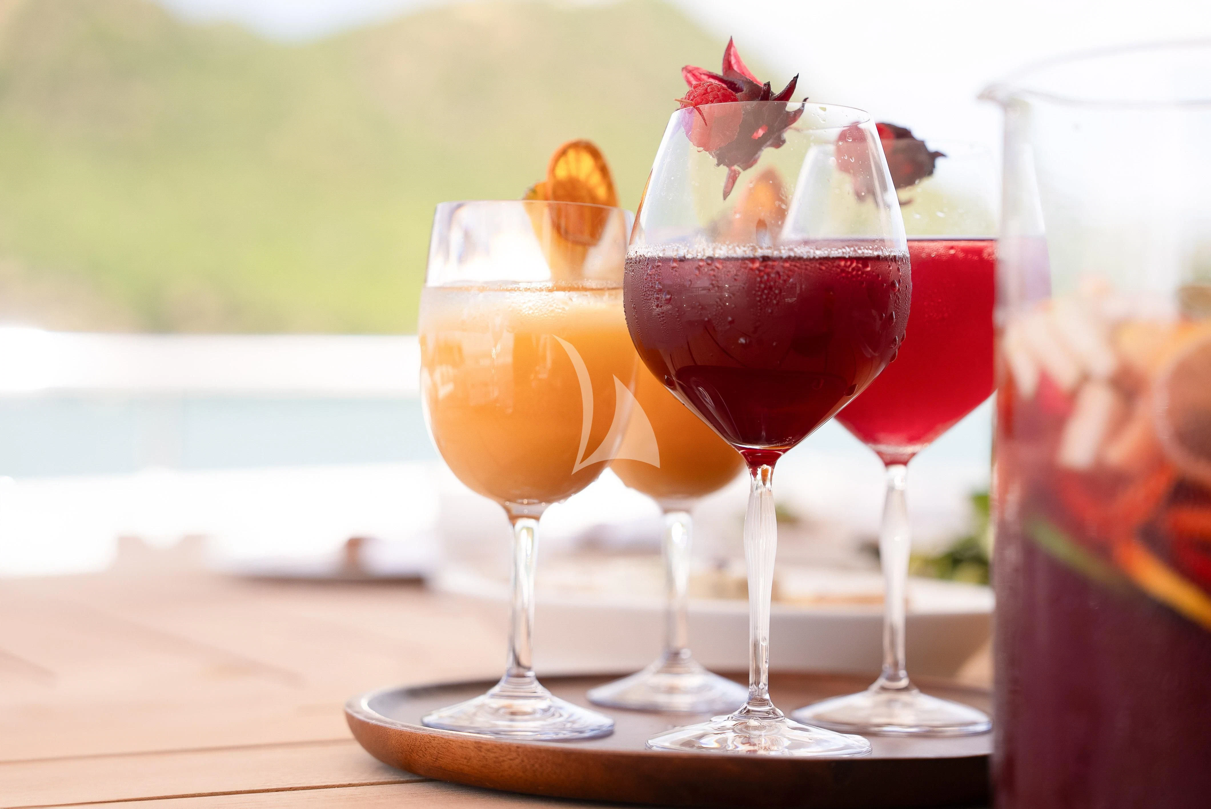 a group of wine glasses aboard RELIANCE Yacht for Sale