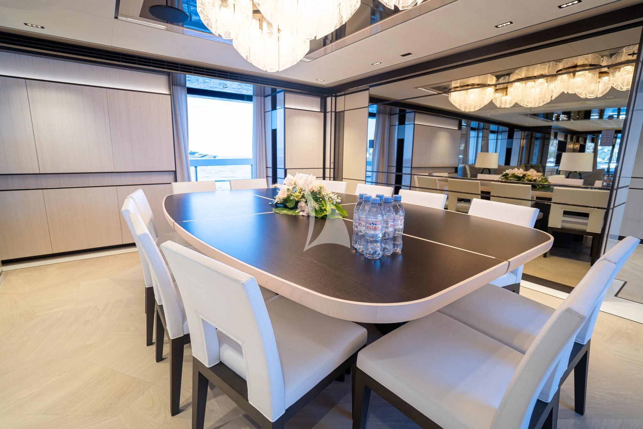 a large kitchen with a table aboard RELIANCE Yacht for Sale