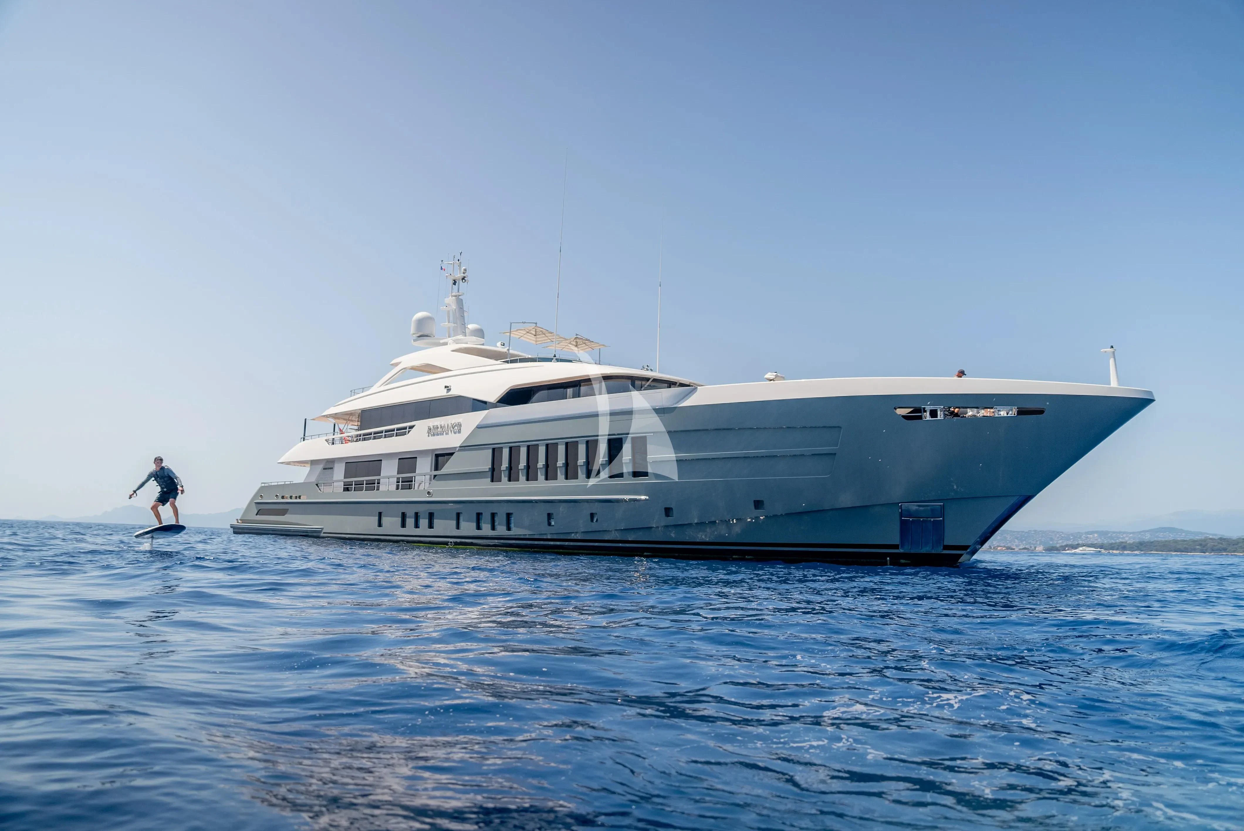 a person walking on a boat aboard RELIANCE Yacht for Sale