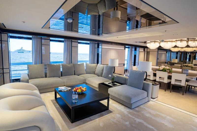 a living room with a large window aboard RELIANCE Yacht for Sale