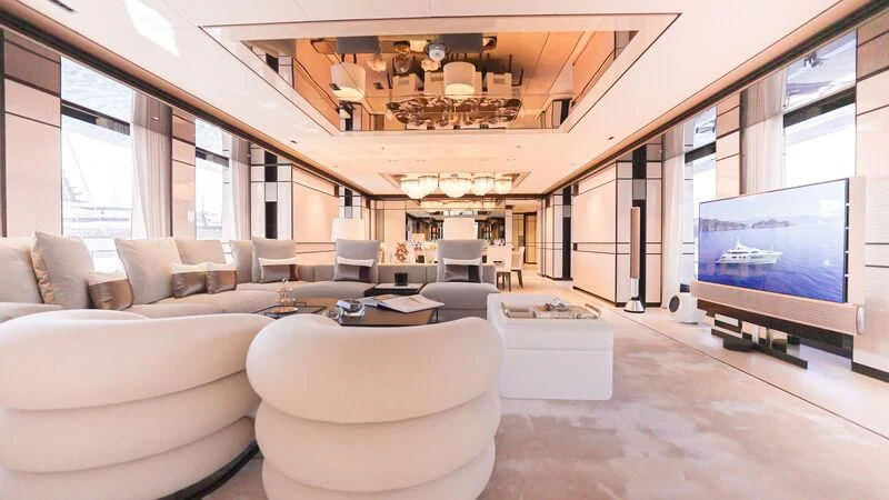 a living room with a large screen aboard RELIANCE Yacht for Sale