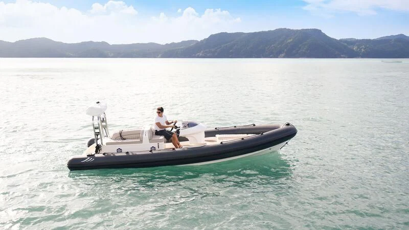 a person on a boat in the water aboard RELIANCE Yacht for Sale