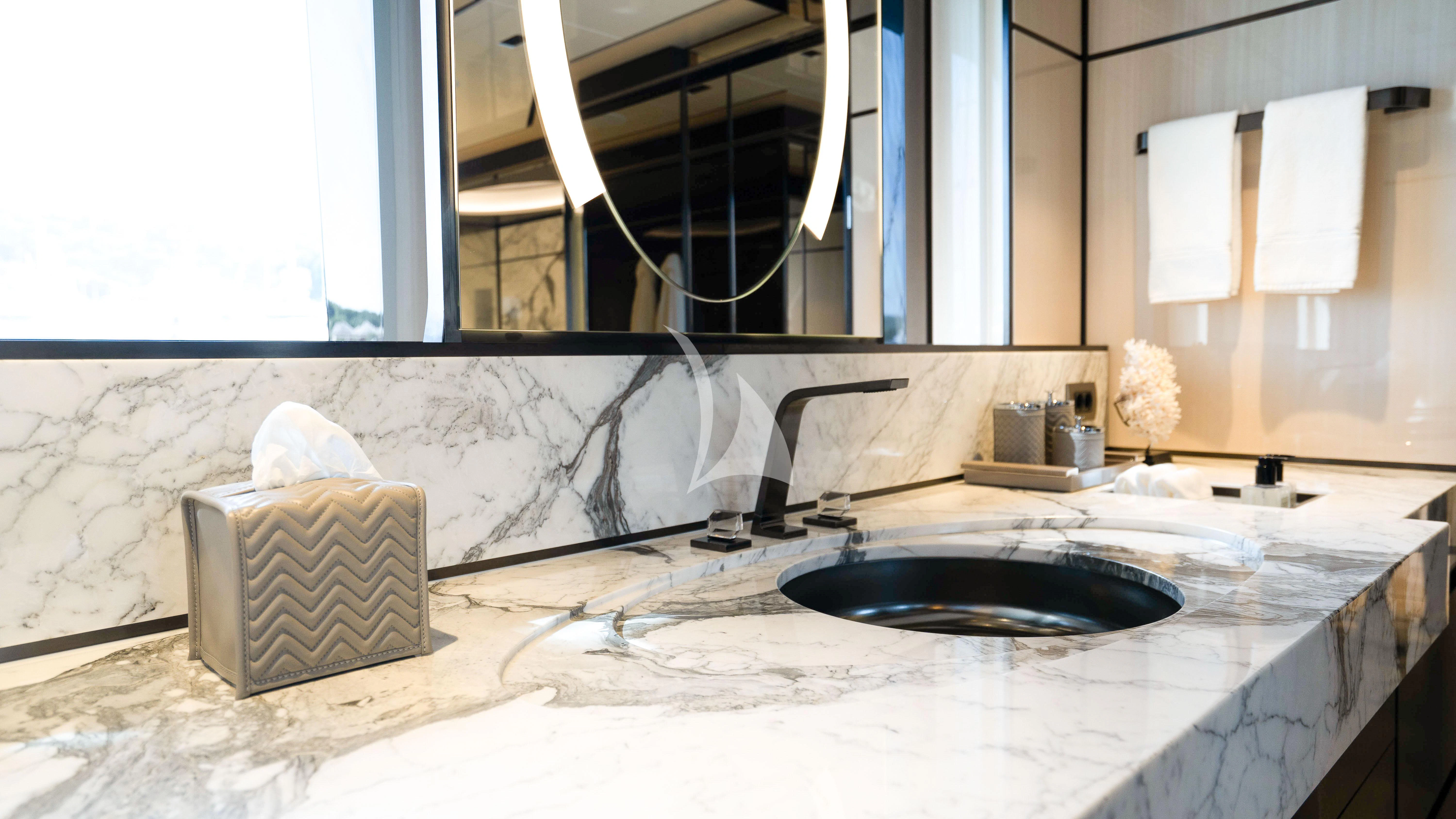 a sink with a sink and a basket aboard RELIANCE Yacht for Sale