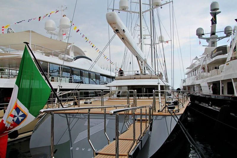 a boat docked at a pier aboard SEVEN Yacht for Sale