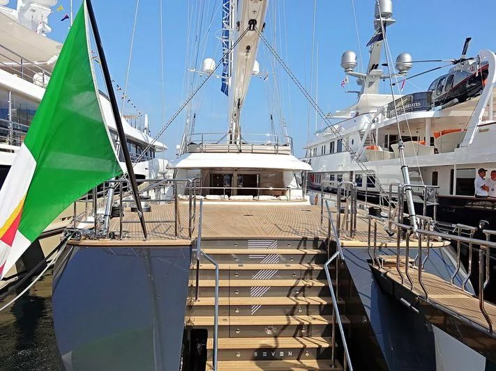 a boat docked at a pier aboard SEVEN Yacht for Sale