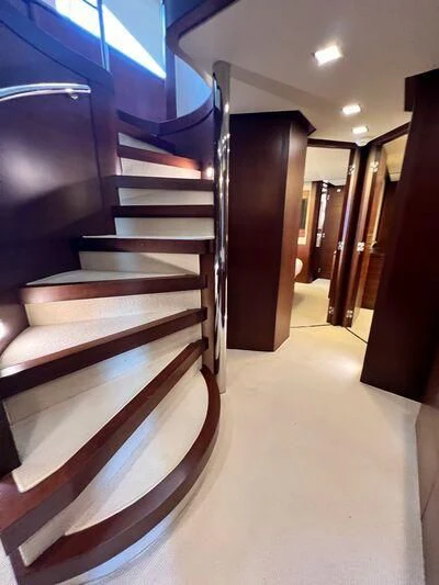 a set of stairs in a building aboard VIVERE Yacht for Sale